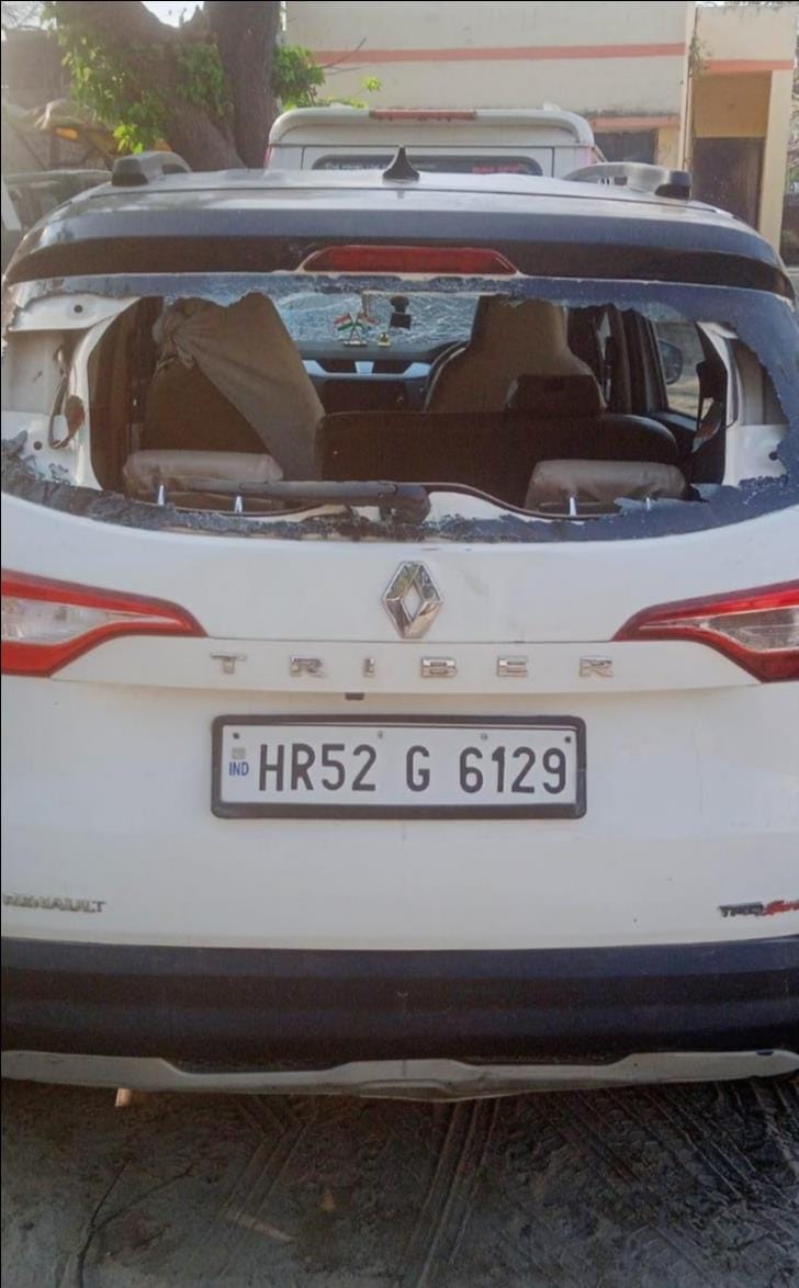Vehicles damaged by stone pelting in the wedding procession