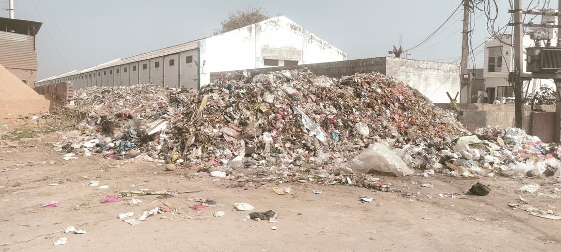 Garbage piles up near residential areas, officials say garbage will be removed in three days