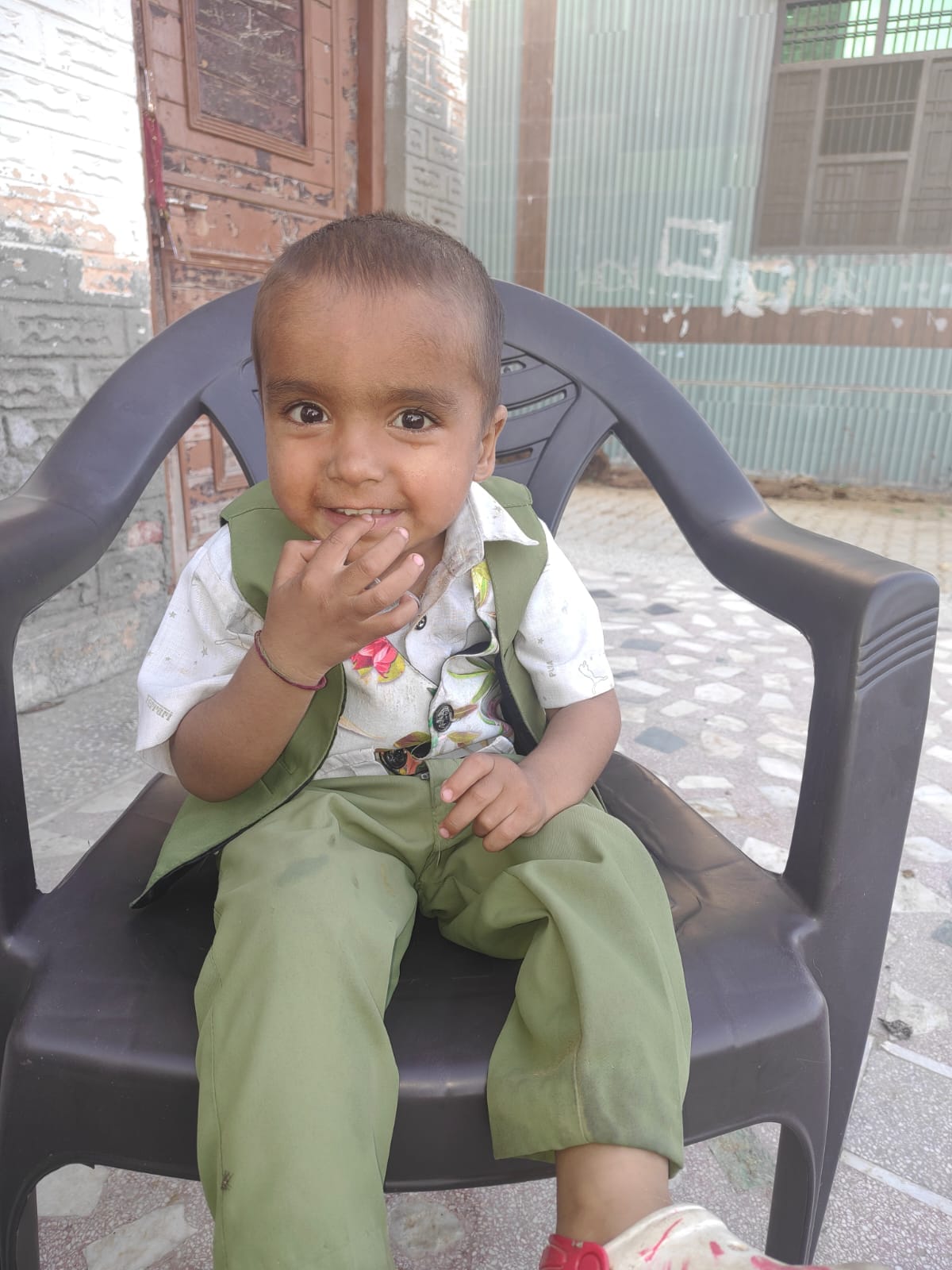 A 12-year-old boy died after drowning in a drain outside his home.