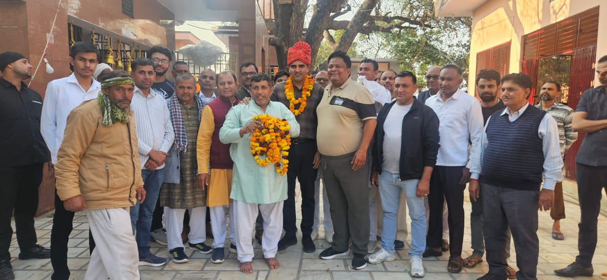 Vikas Sangwan was honoured by Khap officials by wearing a turban on his promotion as Income Tax Commissioner
