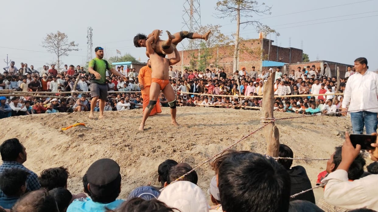 Women wrestlers entered the arena on the last day of the wrestling competition