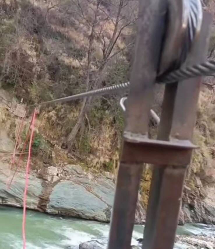 The bridge is washed away, promises remain afloat, but life on Parvati is still dependent on a swing.