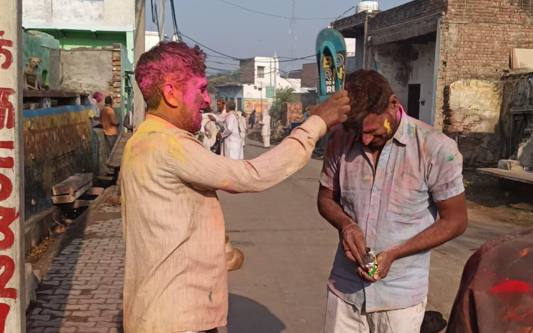 village of Braj festival of shoe-throwing Holi is celebrated