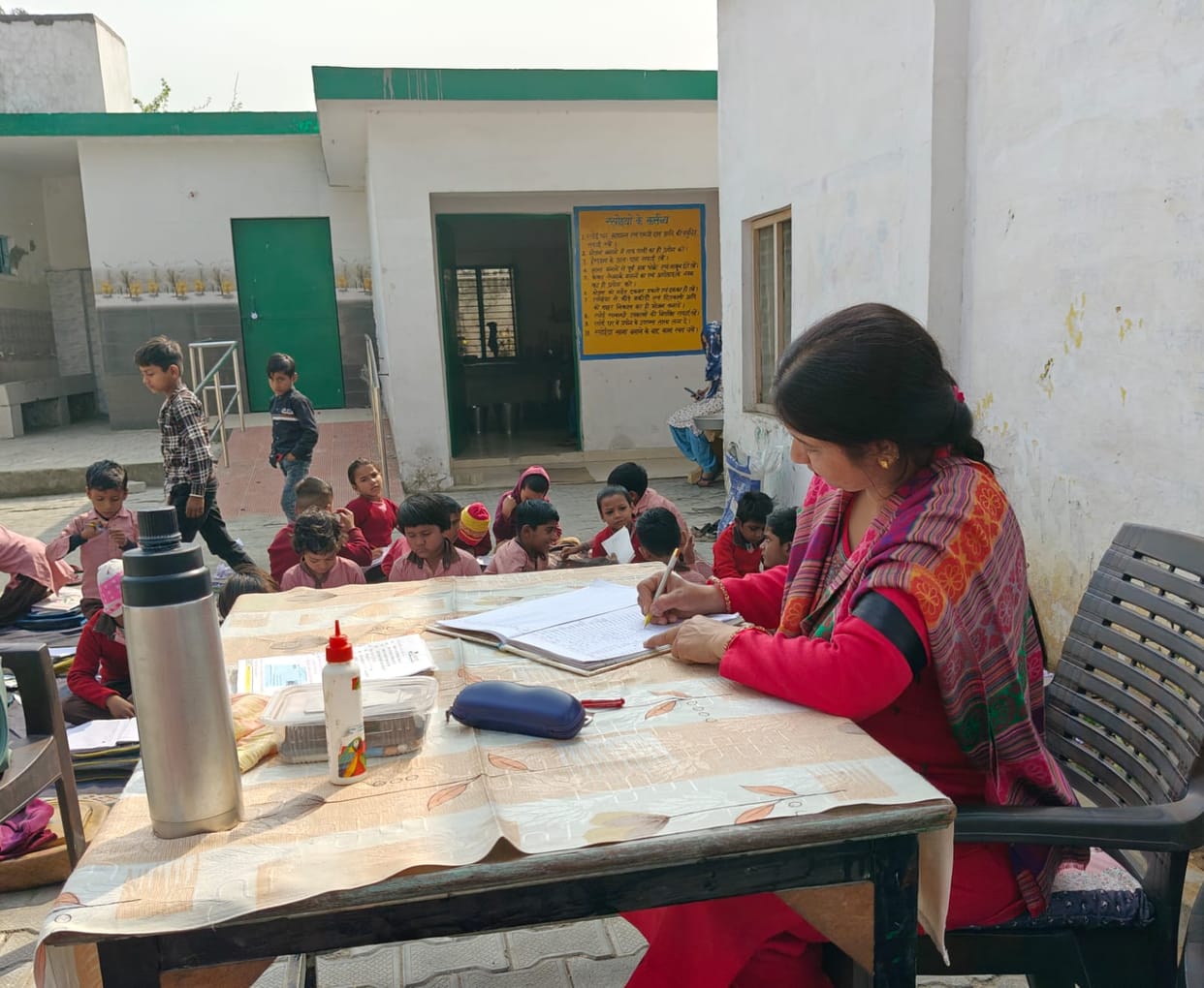 Teachers wearing black bands are teaching to press for their demands.