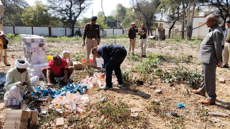 70 boxes of illicit liquor destroyed in Loharu police station premises on court orders