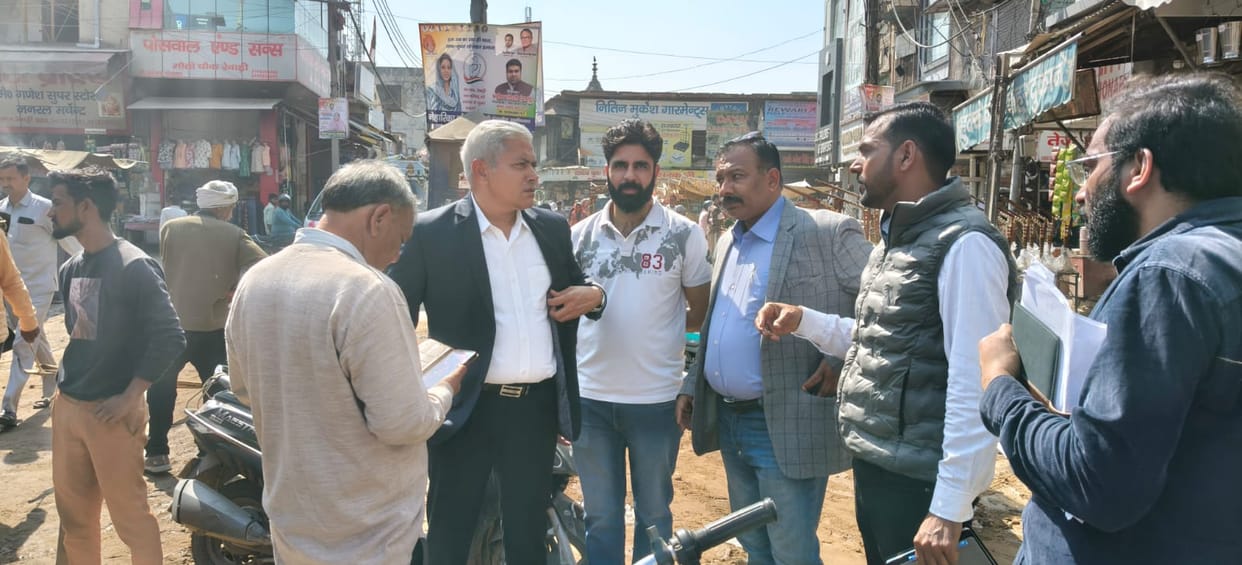 DMC inspected the road construction in the main market.