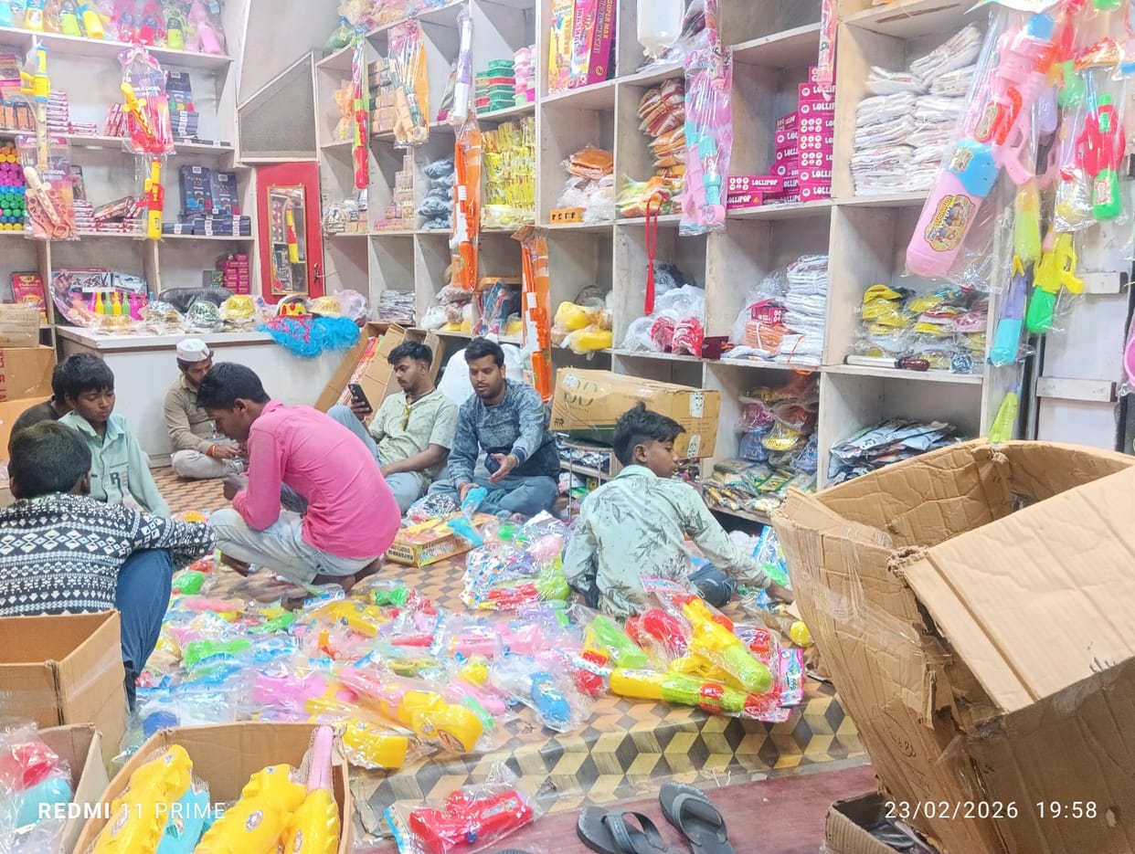 Holi preparations... shops selling colours, gulal and water guns are set up in the markets.