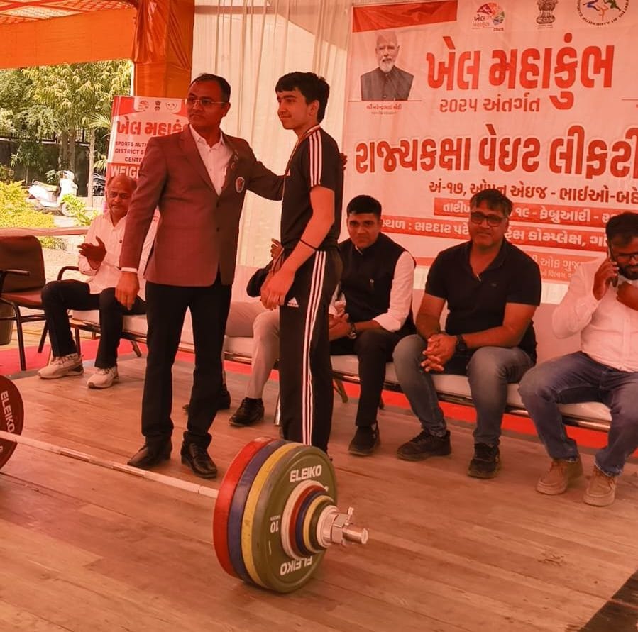 Om won the gold medal in the state level weightlifting competition.