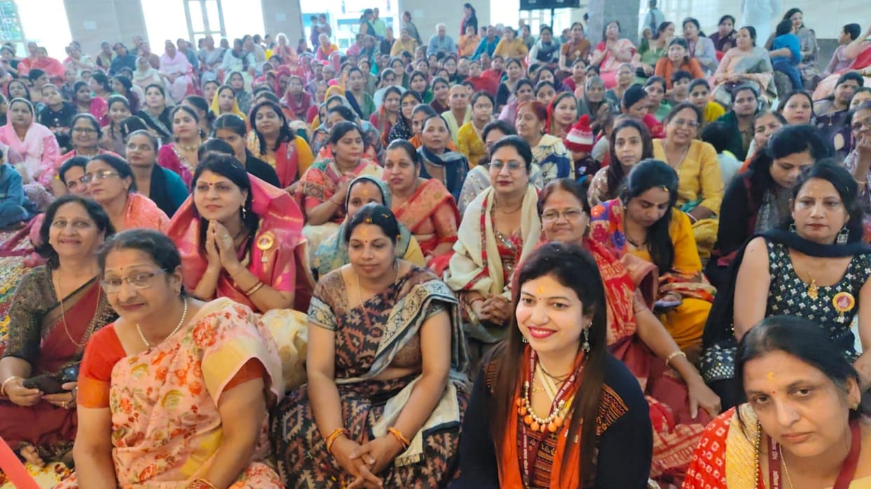 Women and children played Holi with colours, gulal and flowers.