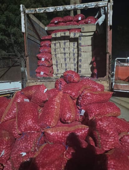 Two arrested for transporting liquor hidden under onion bags