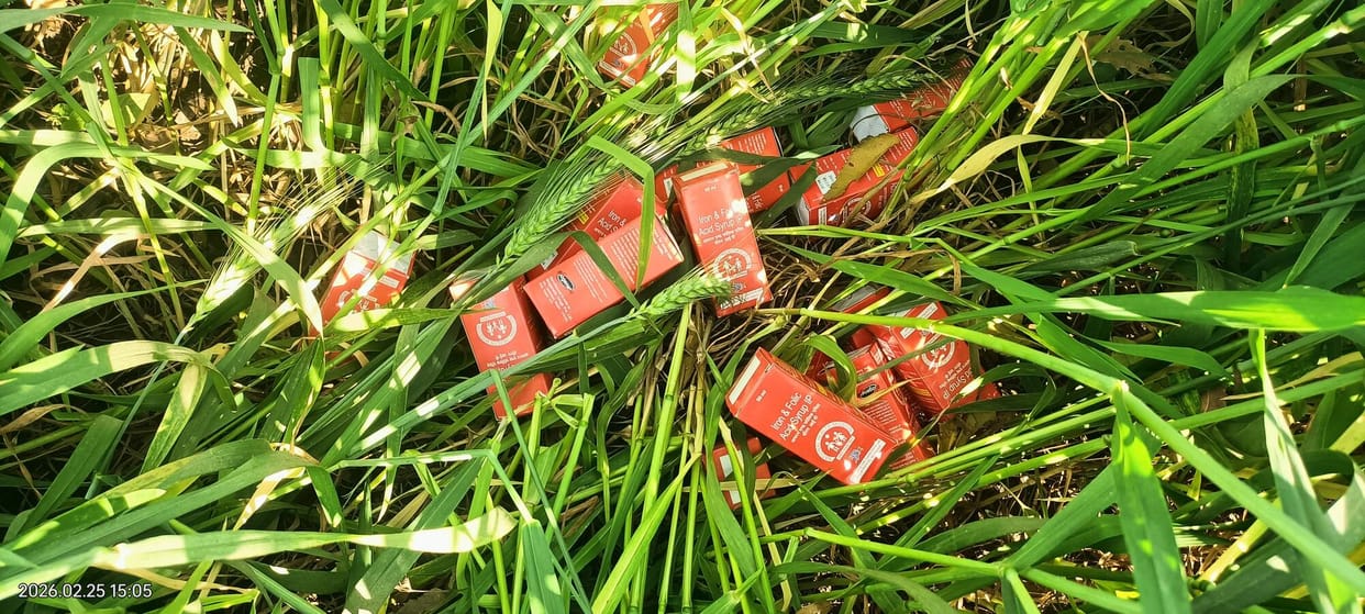 Iron folic acid syrup thrown in the fields on the roadside
