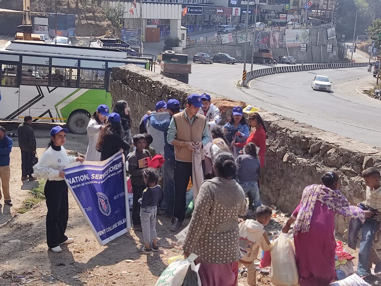 Volunteers from Solan College distributed clothes to needy families.
