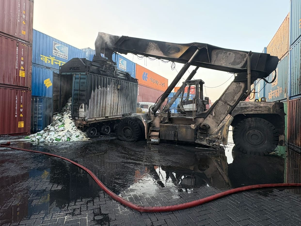 Fire breaks out in container yard, trucks and containers burn, crane driver saves his life by jumping