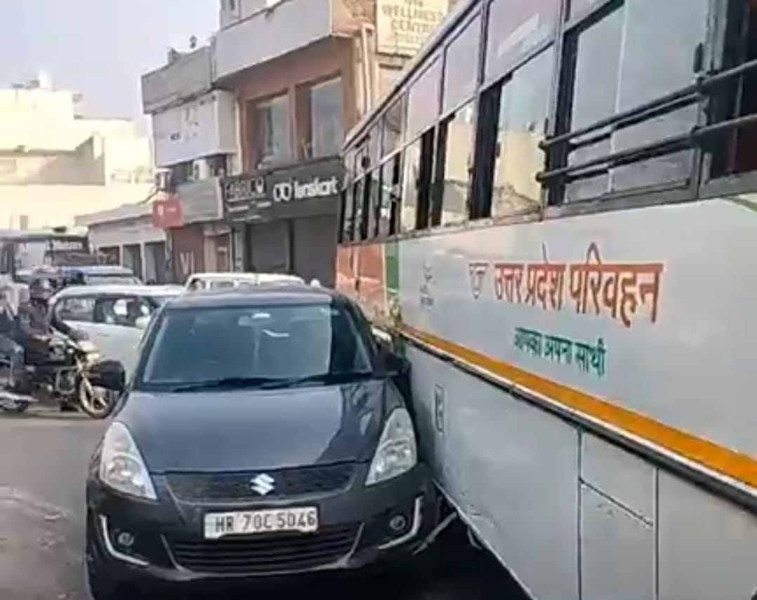 Bus hits car at Ambedkar Chowk, causing traffic jam