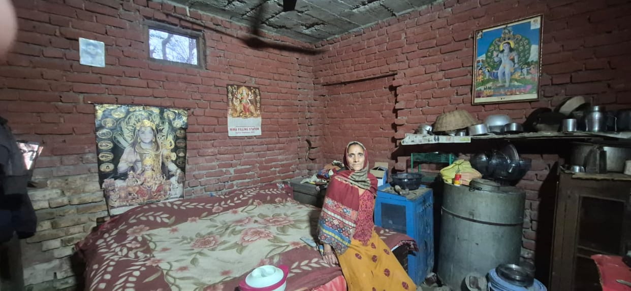 The wounds of the disaster have not healed; an elderly couple in Saur Panchayat lives in a neighbour's home.