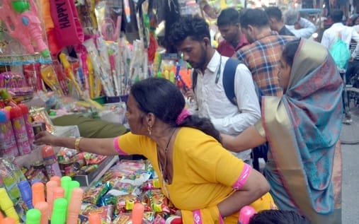 Shops decorated with gulal and pichkaris