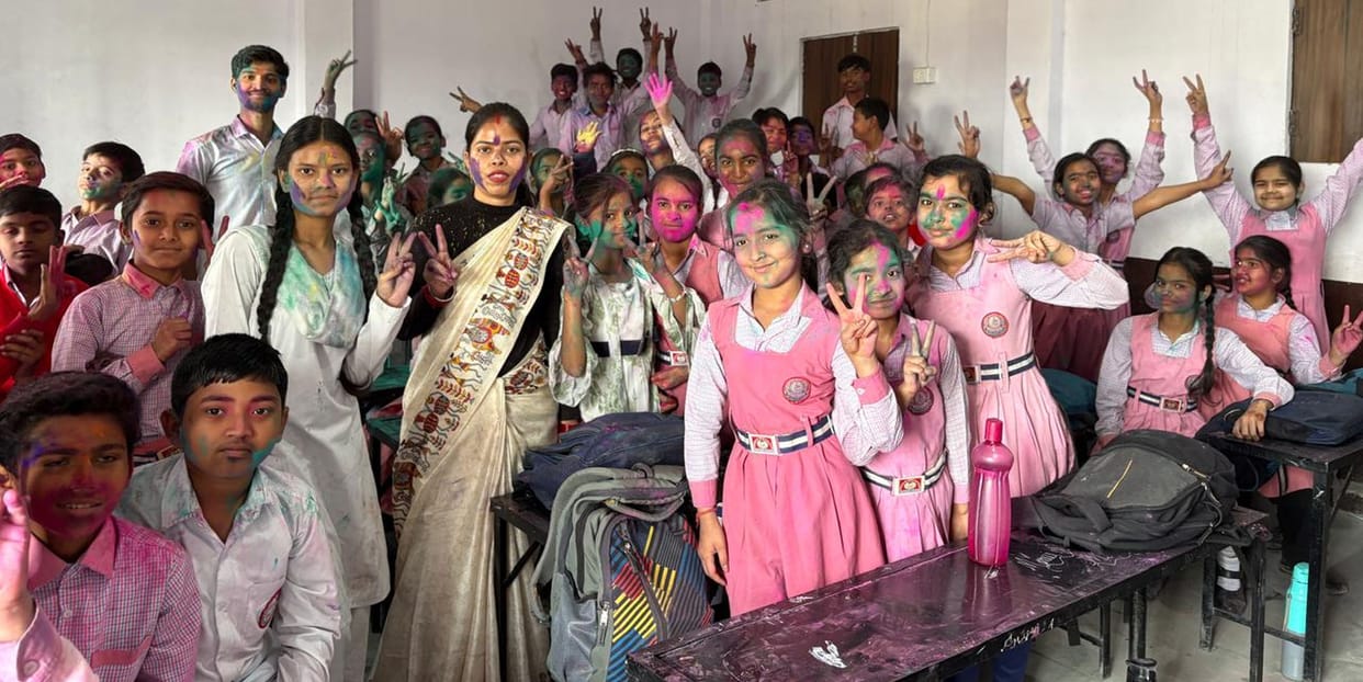Children played Holi by applying gulal to each other.
