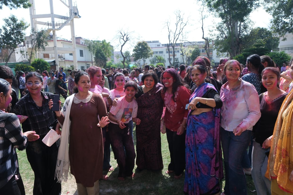 The girl students celebrated Holi by distributing natural gulal and sweets.The girl students celebrated Holi by distributing natural gulal and sweets.