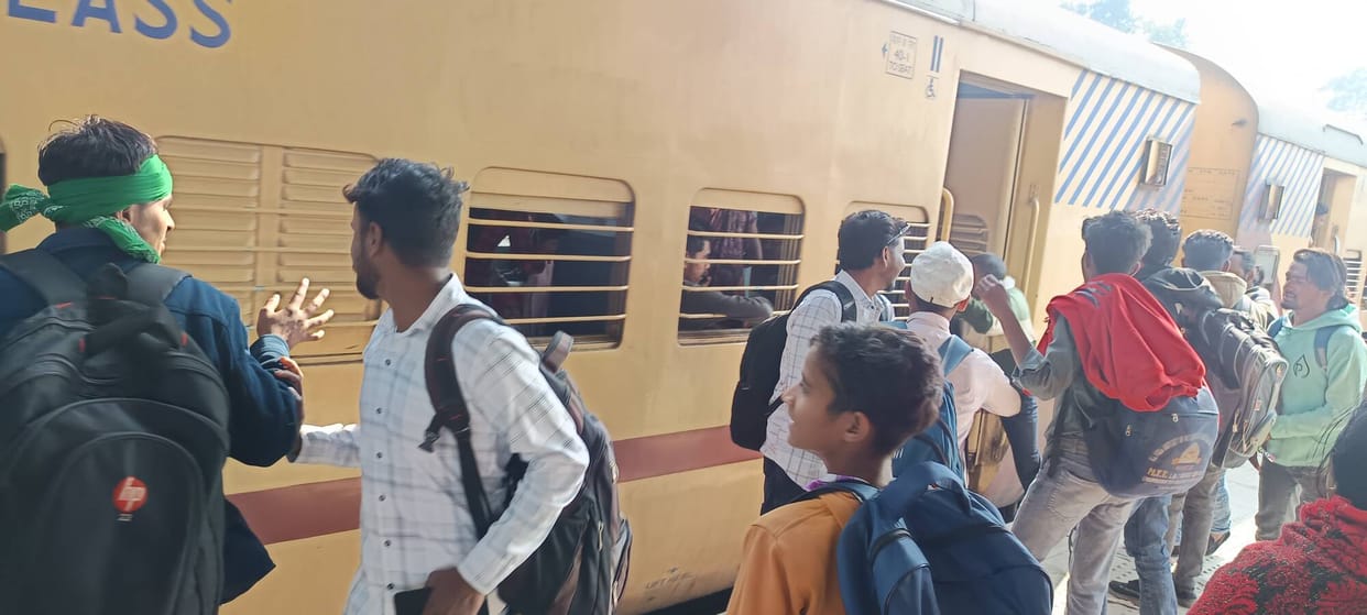 Due to Holi, confirmed train tickets are not available, making travel difficult.