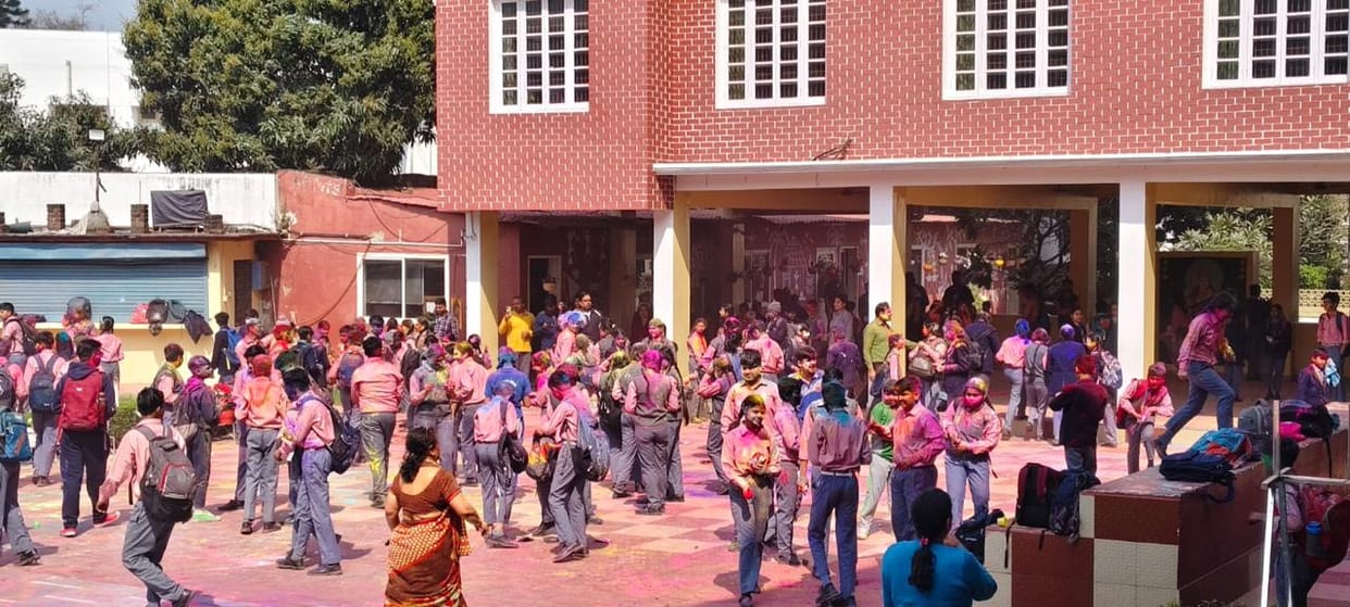 A lot of abir-gulal was thrown... children said- Happy Holi