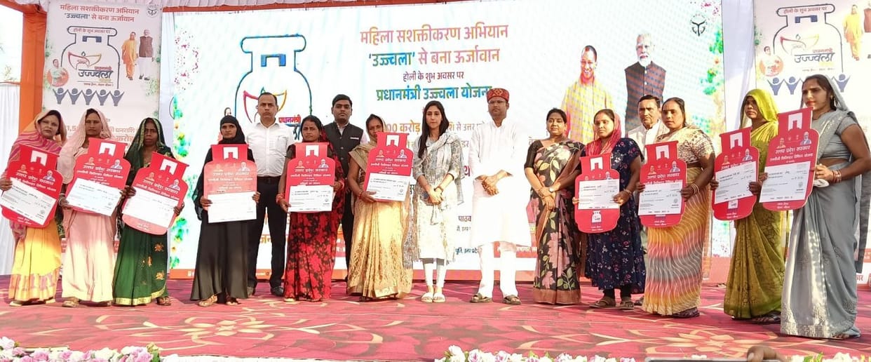 Checks given to the beneficiaries of Ujjwala Yojana
