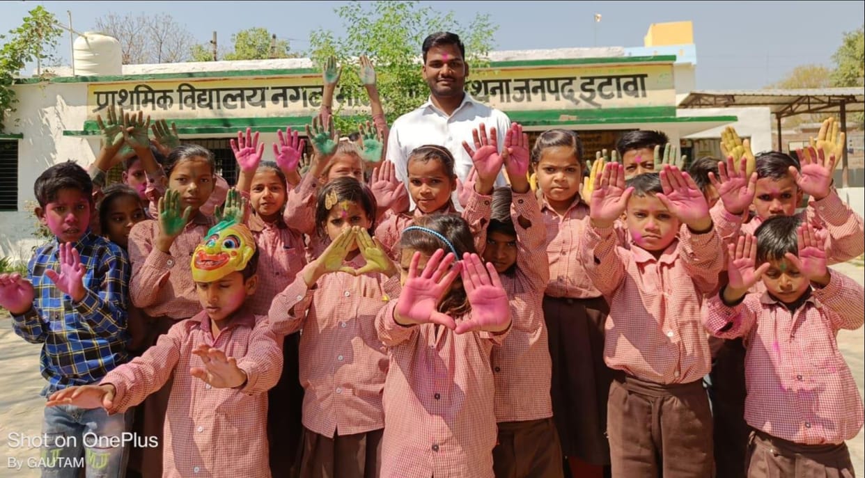 Students immersed in the fun of colors, faces looked green and red