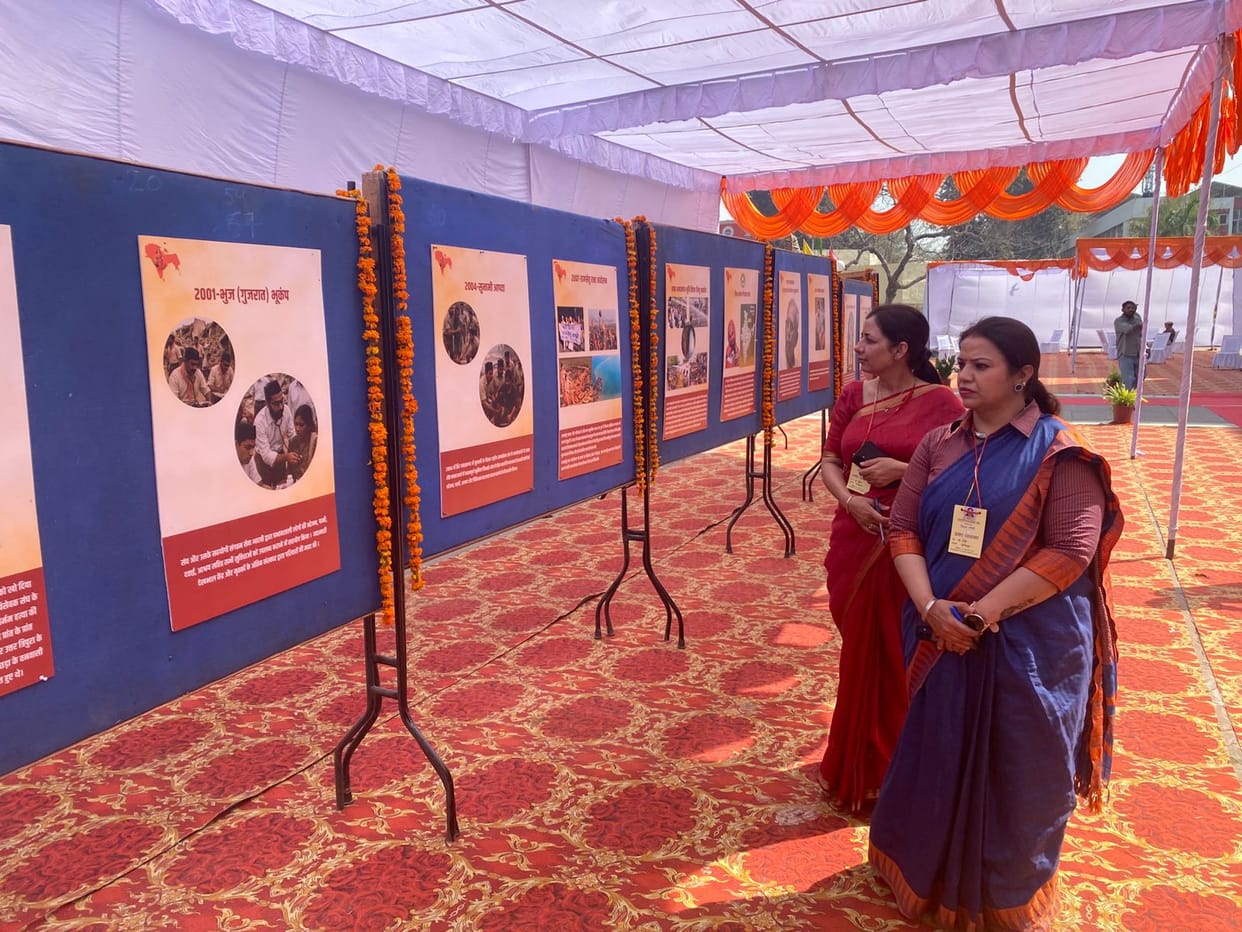 28 posters helped new workers understand the Sangh's 100-year journey.