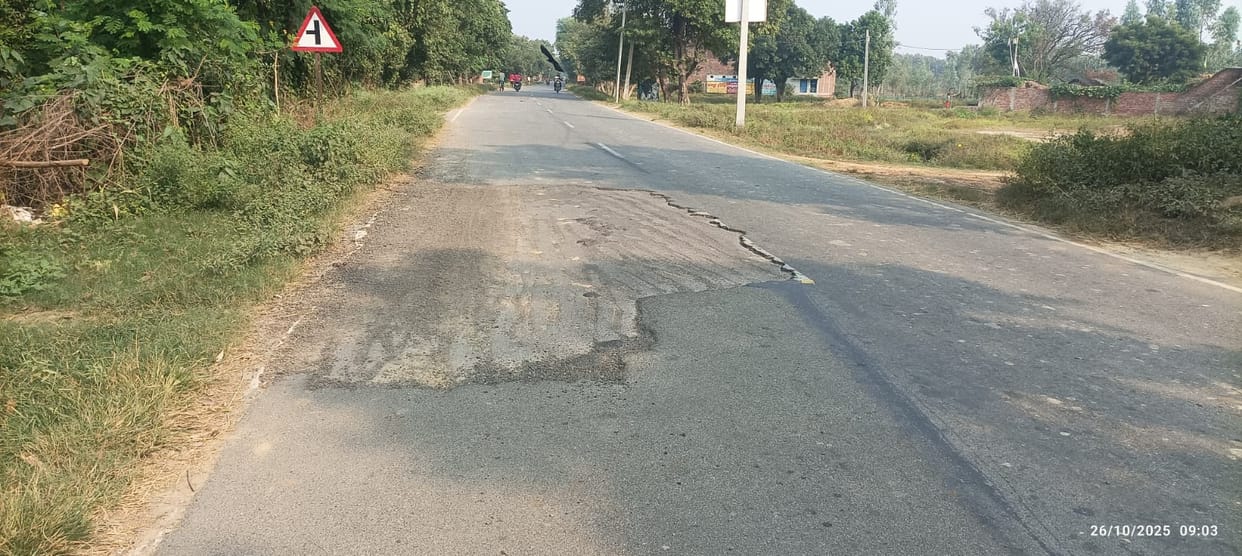 The new road is full of potholes, causing inconvenience to pedestrians.