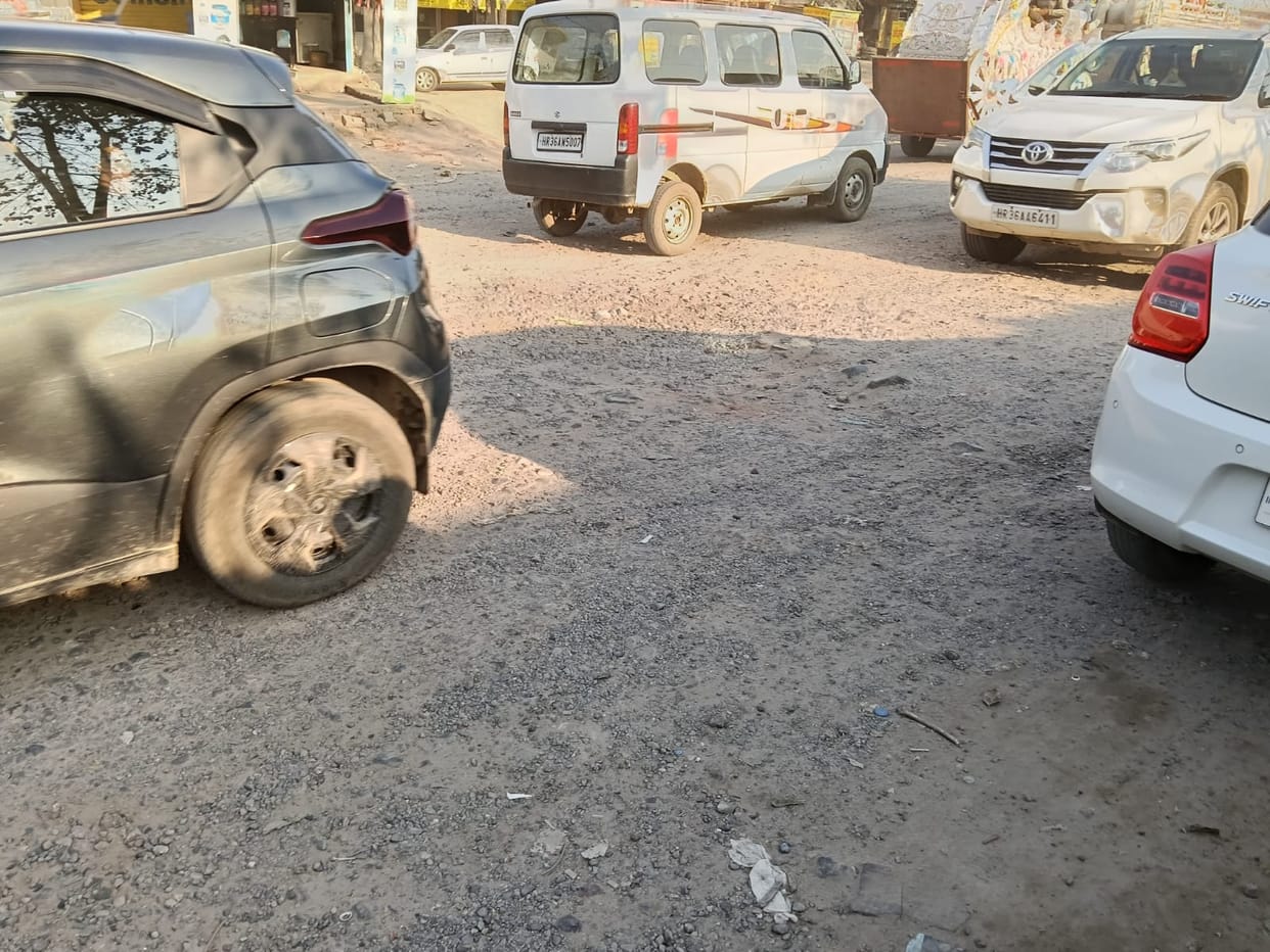 Uprooted stones, potholes formed on Rewari-Kotkasim road