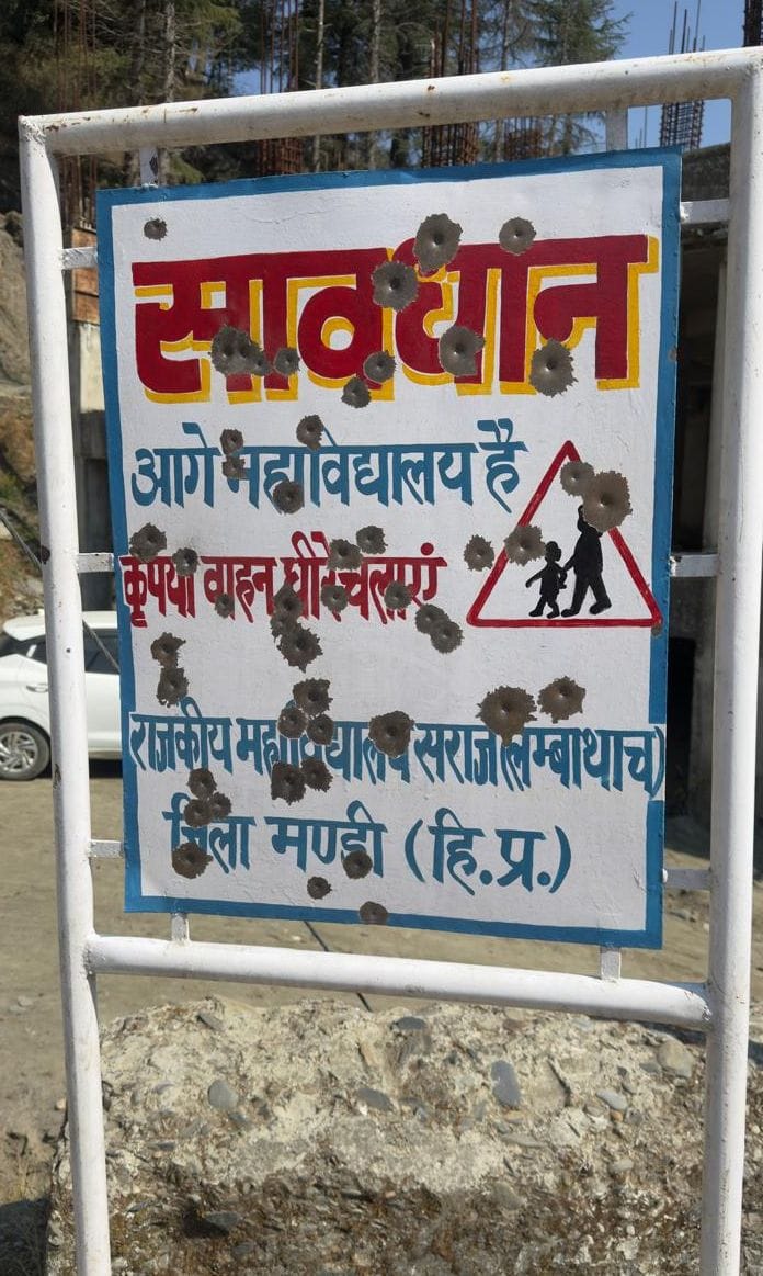 Gun firing at the notice board of Lambathach College