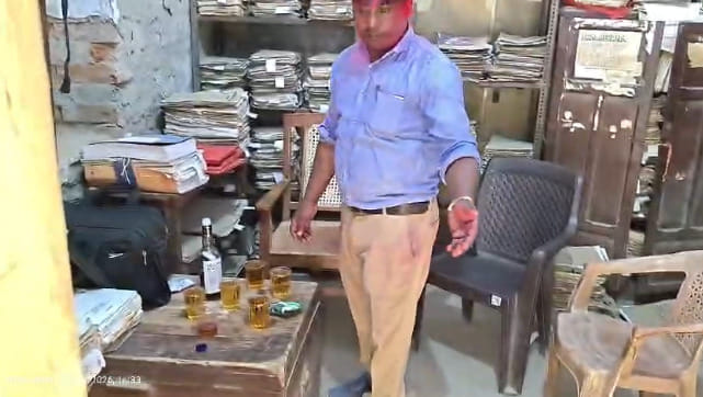 Consolidation office becomes 'bar': liquor spills on government tables