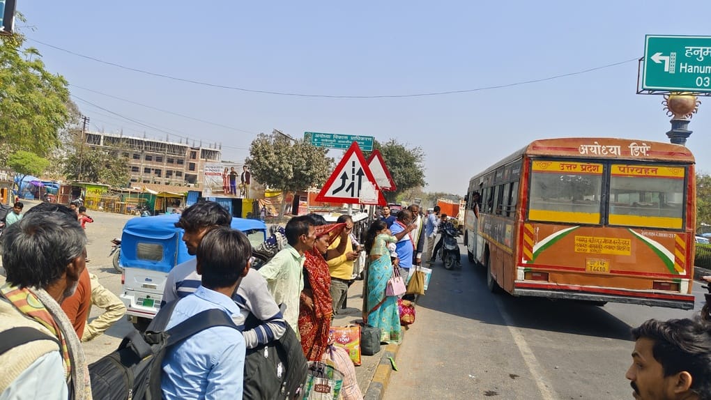 No space in trains, passengers wait for buses on the highway