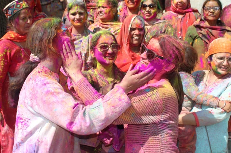 A lot of abir-gulal was thrown in the city of Lord Raghunath.