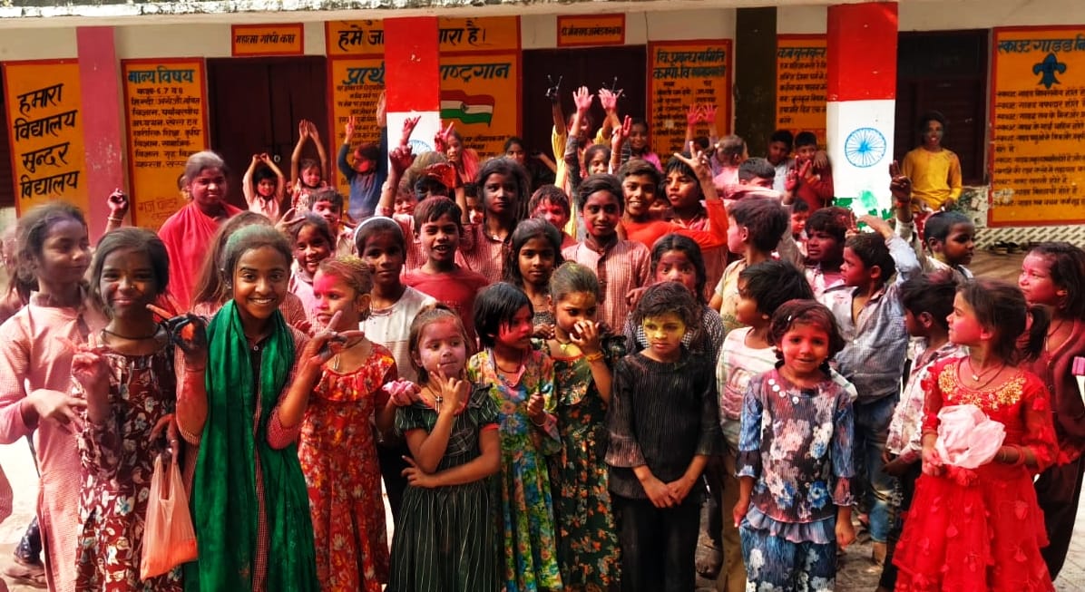 Children played Holi with flowers and had a lot of fun.