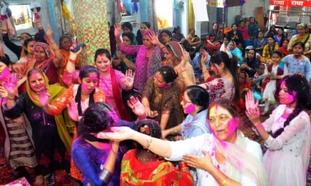 Colors and gulal rained before Holi, people got drenched.