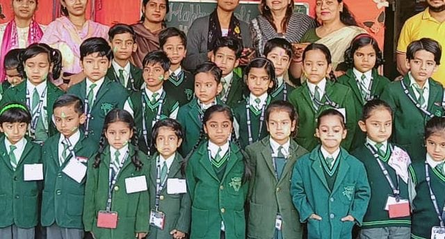 In schools, children played Holi by applying gulal to each other.