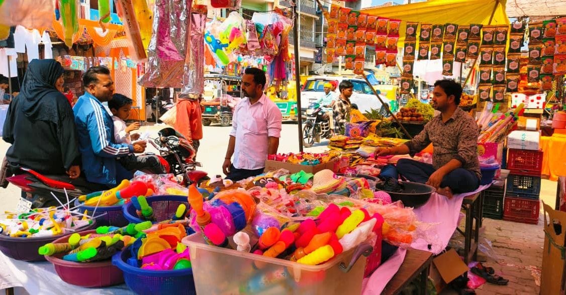 Holi preparations bring colour to the market, increasing activity