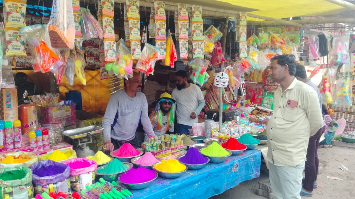 Holi colours spread, markets decorated with water guns and gulal