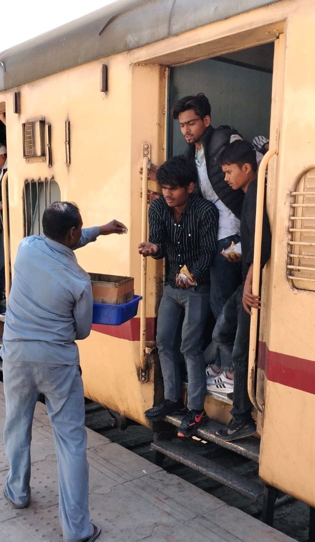 There was a scramble for seats in trains, people travelled by hanging on the footboard.
