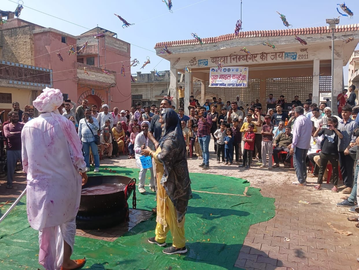 Holi was played en masse in Kandela, drum beats resonated.