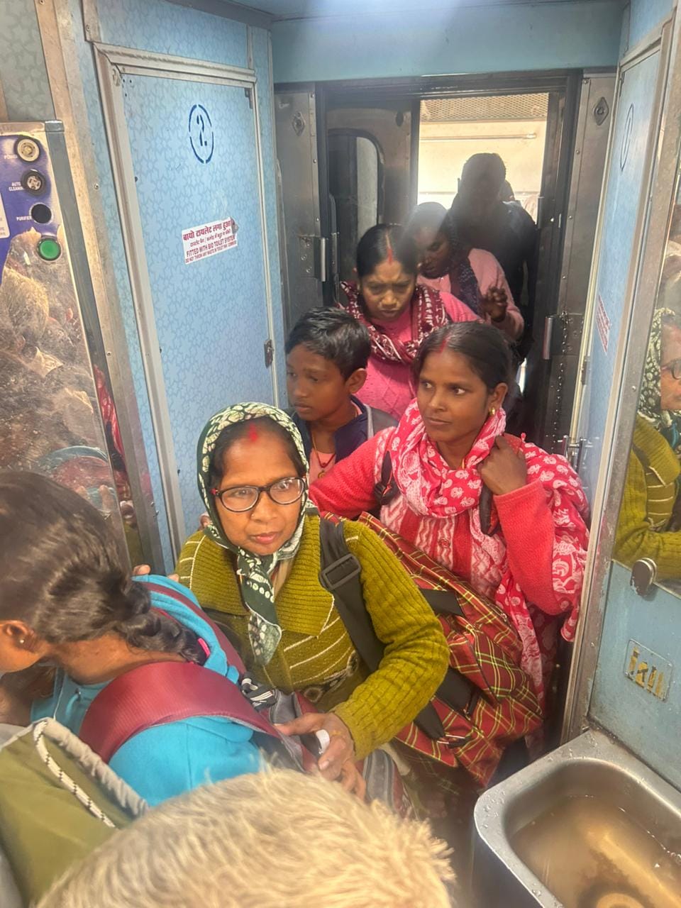 Travelers are struggling to reach home, spending their journeys standing near toilets.