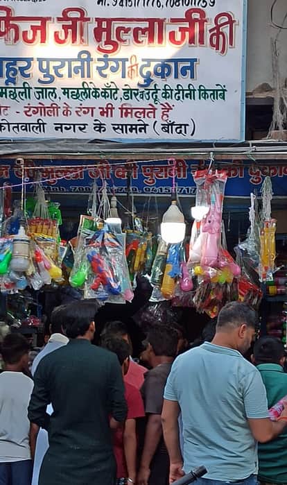 Despite the lunar eclipse, Holi markets are full of political colours, with indigenous products in great demand.