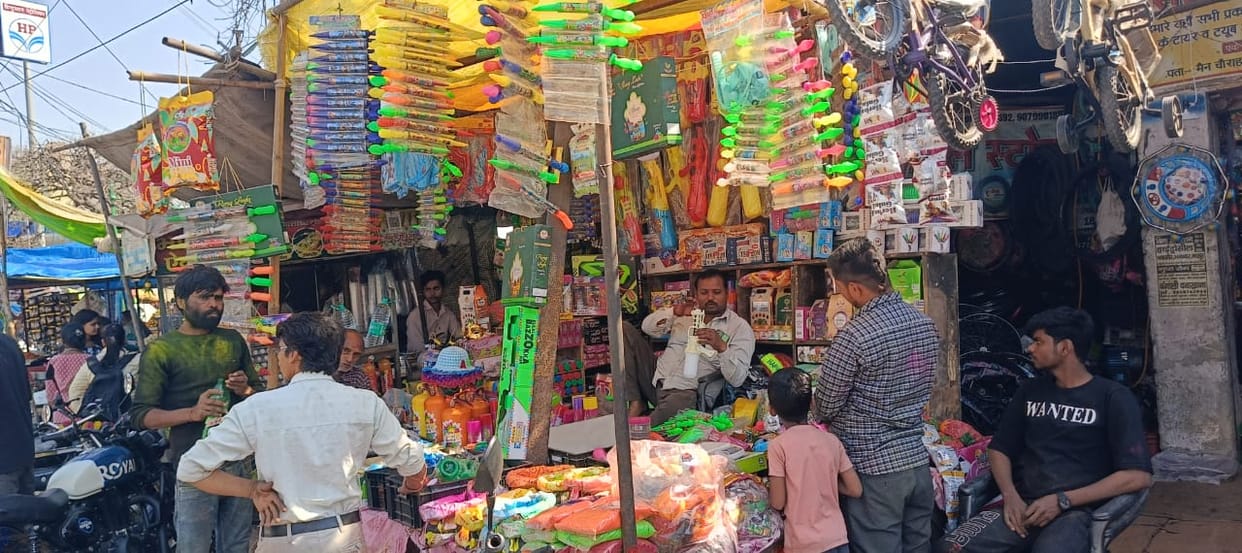 Colours, gulal and water guns were sold all day long, today will be a blast.