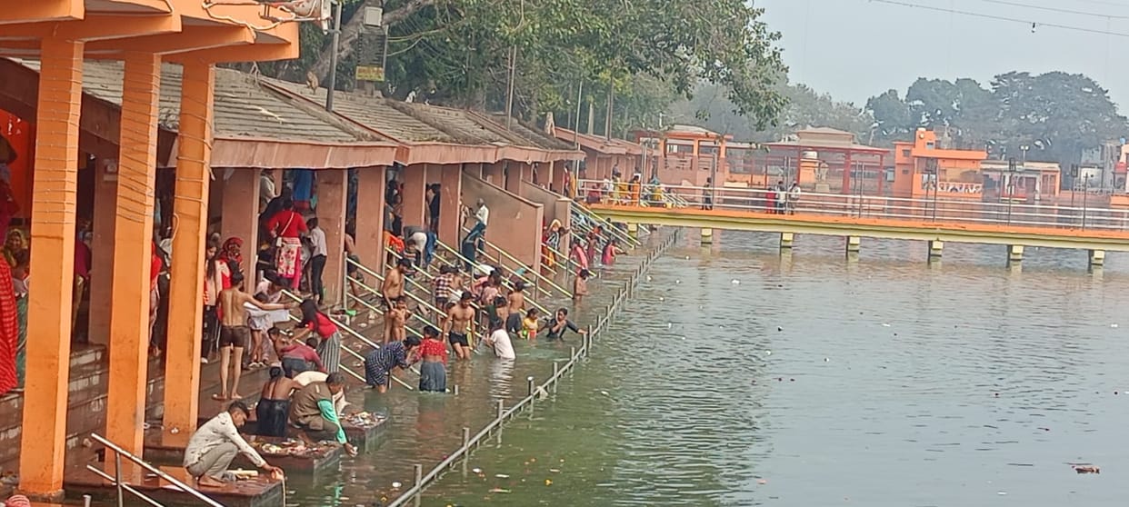 Devotees bathe in the Ganges on Falgun Purnima