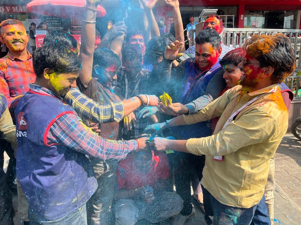 People were seen painted in the colors of Holi, the festival of colors and fun.