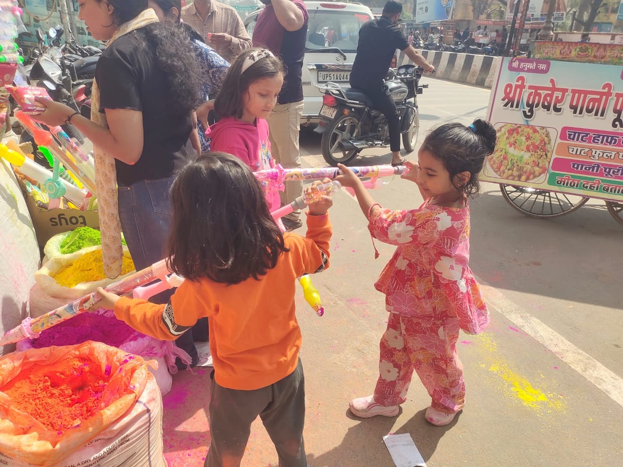 Holi's excitement is all over the place... showers of colours started a day before.