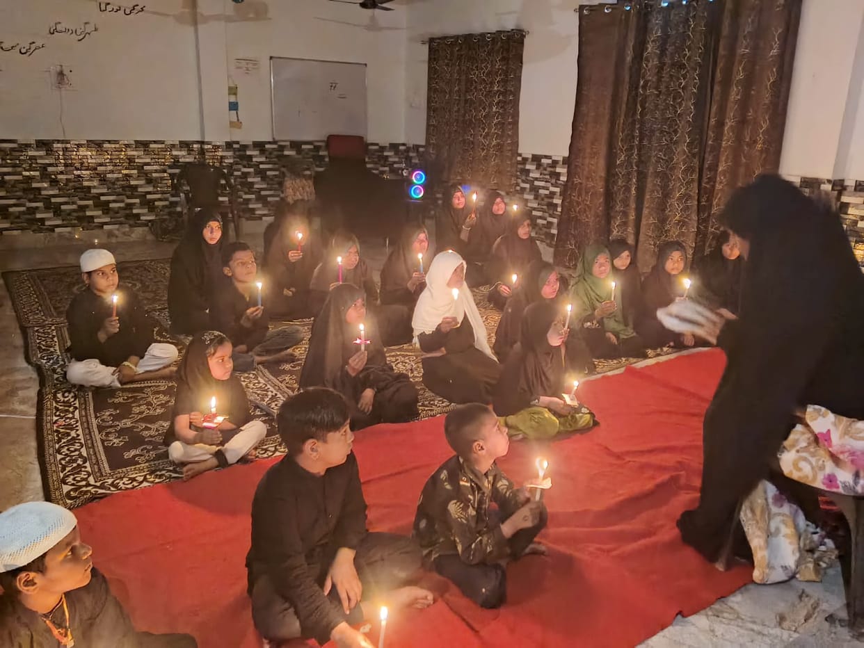 Tribute paid to Khamenei by taking out a candlelight march