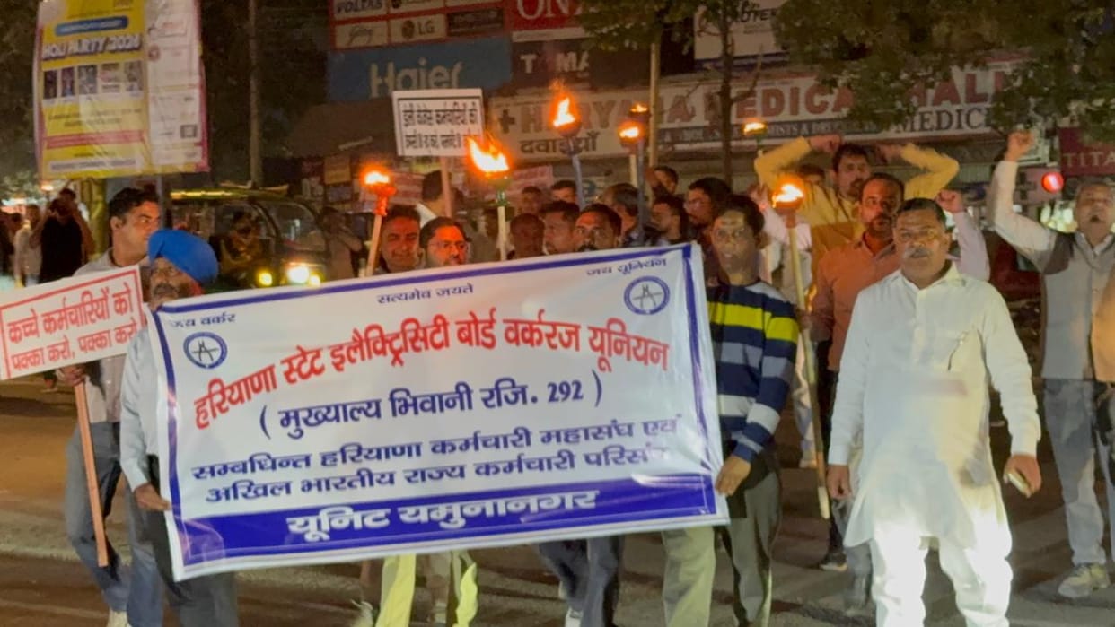 Electricity workers took out a torchlight procession
