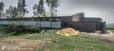 Liquor packaging racket in a closed poultry farm, two arrested including a gangster