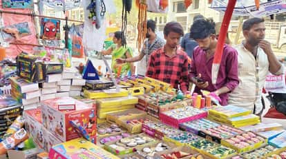 Crowds gathered in the market on the eve of Holi
